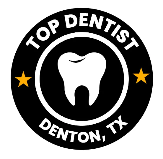 Top Dentist badge logo featuring white tooth icon with gold stars for Denton, TX dental practice.